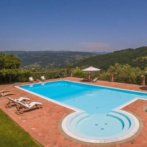Slip into the swimming pool and take in the views from the water's edge