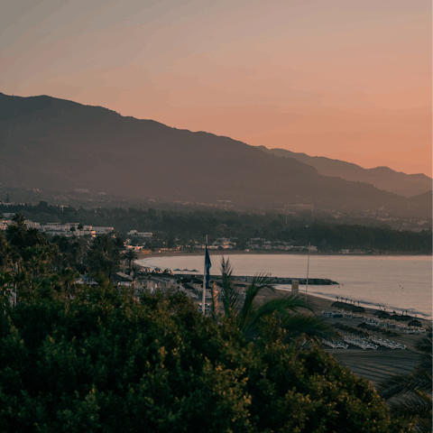 Visit Marbella, known for its popular beaches and nightlife, only a short drive away