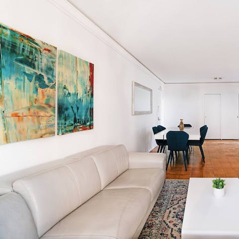 Admire the colourful abstract prints dotted around the apartment