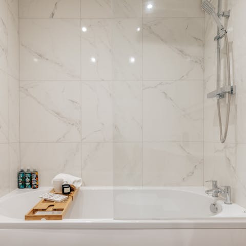 Treat yourself to a rejuvenating session in the home's elegant bathtub
