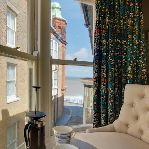 Sip your morning coffee by the bedroom's bay window and  gaze out to the North Sea