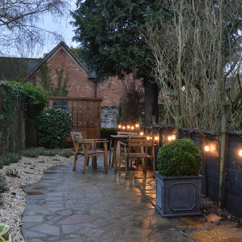 Enjoy romantic dinners alfresco in this storybook garden (weather permitting!)