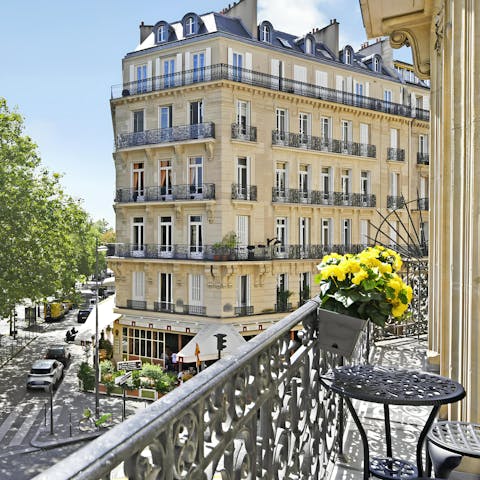 Sip your morning coffee on the balcony as you gaze out over the tree-lined streets below