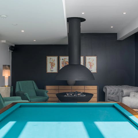 Warm yourself by the firepit or play a round of pool in the lounge