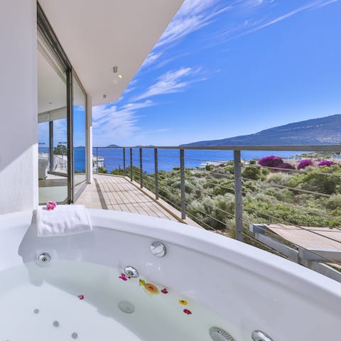 Relax with a drink and take in the views from the Jacuzzi