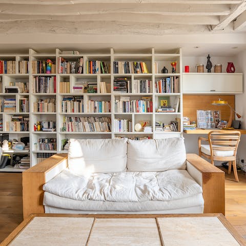 Choose a book and get comfy on the sofa with a glass of French wine