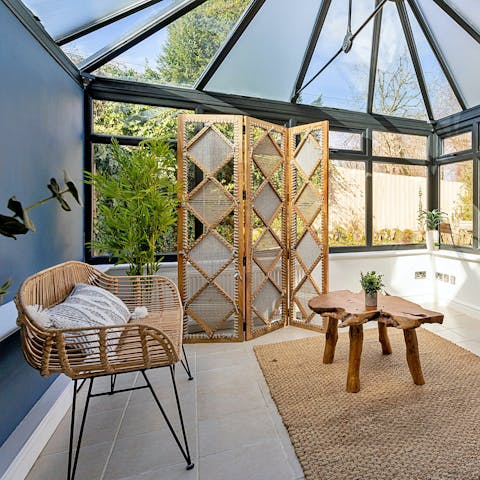 Enjoy a morning coffee in the sunny conservatory