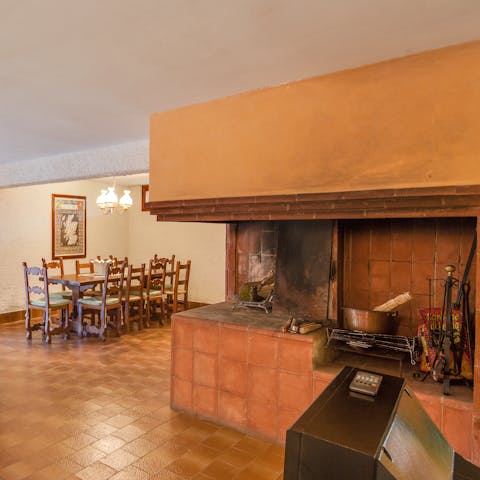 Admire traditional features of an Italian country home, such as the open stove