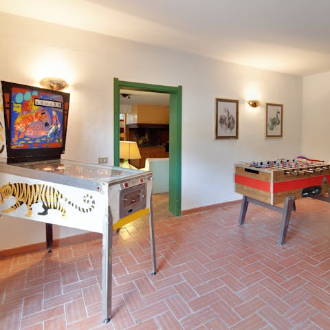 Challenge your friends to a game of table football in the games room