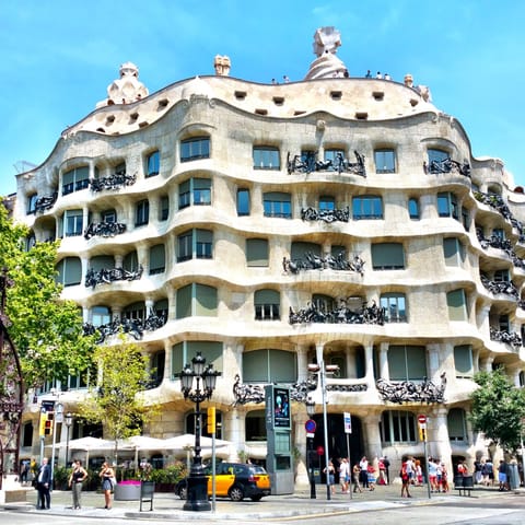 Explore lively Eixample's array of restaurants, bars and quirky architecture –  Casa Milà is less than ten minutes away