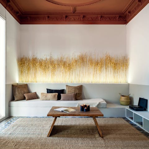 Unwind in the Japanese-inspired living area with a glass of Spanish wine and Netflix on the TV