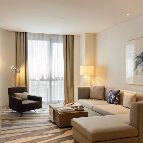 Gaze out over views of Dubai from the apartment's floor-to-ceiling windows
