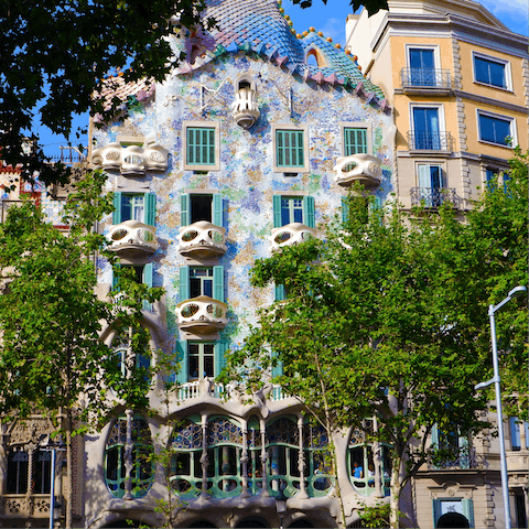 Visit Gaudí's eye-catching Casa Batlló, a short walk away