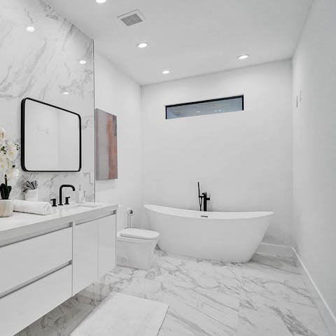 Pamper yourself in the luxurious marble master bathroom