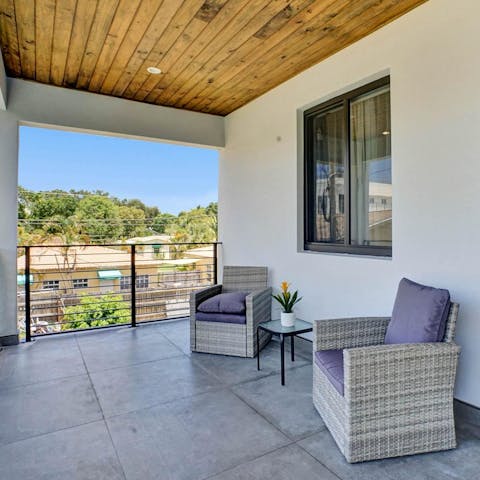 Take a break on the first-floor balcony, with lovely views over the garden