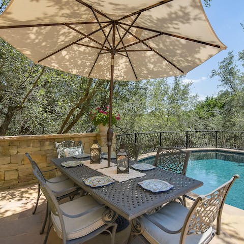 Enjoy lunch outside by the pool