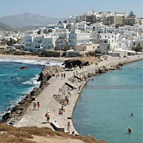 Make the short drive into the Port of Naxos