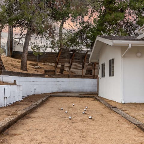 Play a round of bocce while you wait for the barbecue to heat up