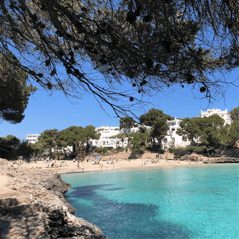 Visit the breathtaking beach of Cala d'Or, based just a short drive away from the home