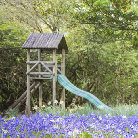 Take in the tranquil surroundings while the kids happily enjoy the play area