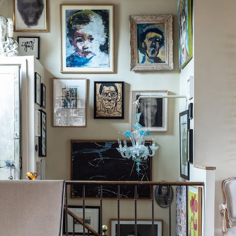 Marvel at the collection of artworks throughout the home