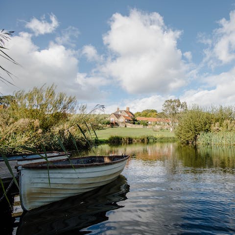 Drift off on the ground’s rowing boats and meet the resident ducks