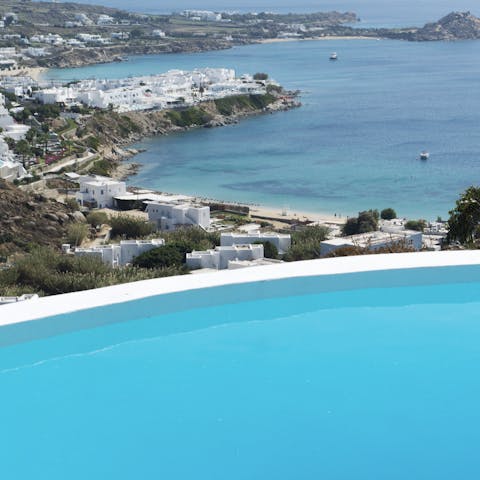 Gaze at the stunning views of the Mediterranean from your private heated pool