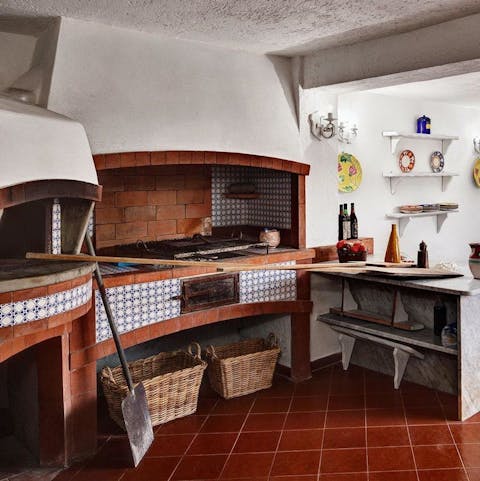 Embrace southern Italian cuisine with a pizza made in the wood-fired grill