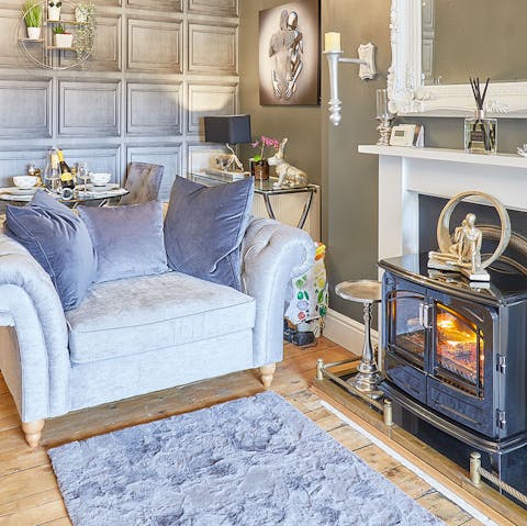 Curl up with a good holiday read warmed by the fire of the wood burner