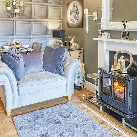 Curl up with a good holiday read warmed by the fire of the wood burner