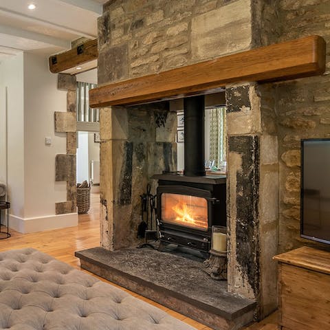 Snuggle up in front of the log burning stove