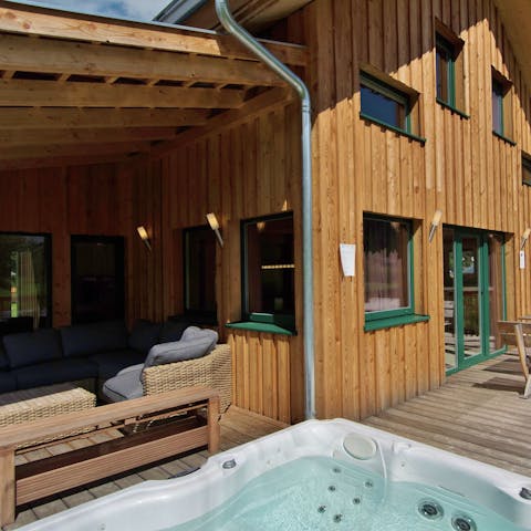 Put your feet up in the outdoor lounge or indulge in a soak in the hot tub