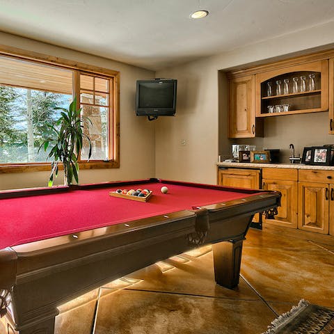 Rustle up some cocktails at the wet bar and start a game of billiards