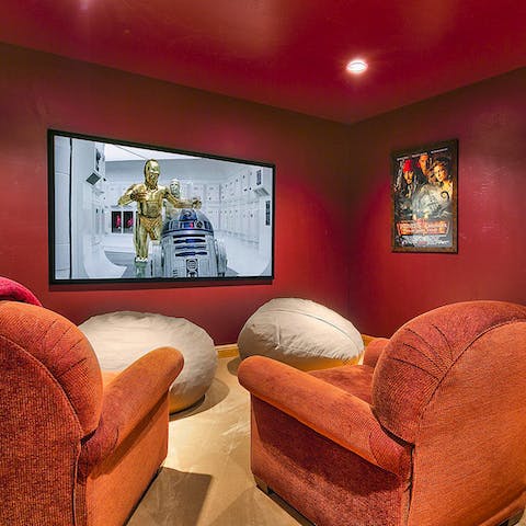 Get together for a family movie night in the cinema room