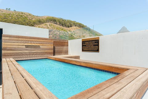 Return to the communal plunge pool after driving out ten minutes to Clifton Beach