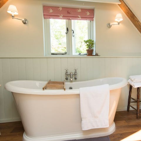Treat yourself to a long soak in the freestanding bathtub