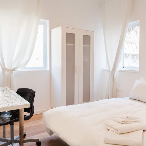 Turn this serene second bedroom into your work office, if you're travelling solo