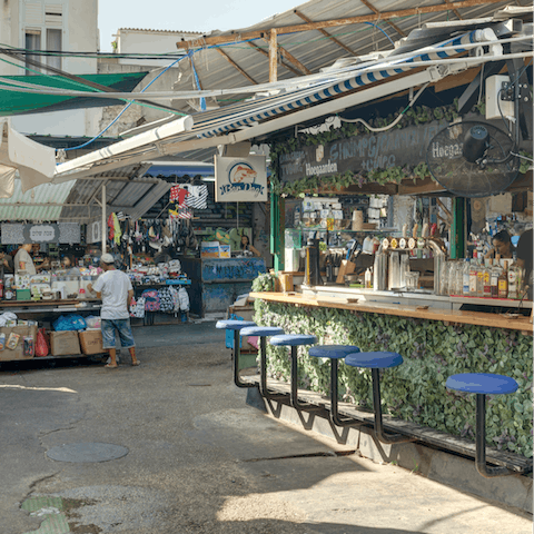 Explore Carmel Market – the largest shuk in Tel Aviv – also within walking distance