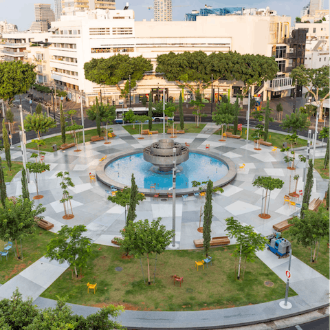 See the iconic Dizengoff Square fountain, only a five-minute walk away from home