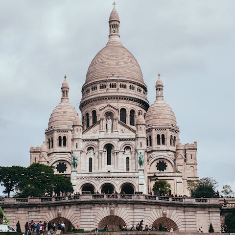 Take the fifteen minute stroll uphill to the Sacré-Coeur for the best views of Paris