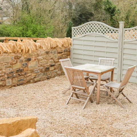 Get together for morning coffees in the private courtyard with woodland views