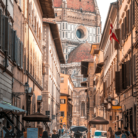 Walk ten minutes to Florence's famous red-domed Duomo