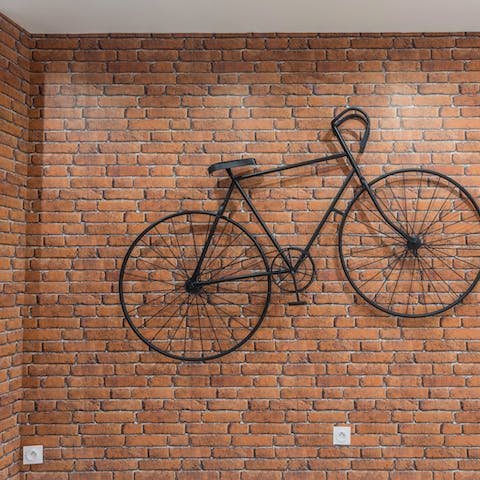 Admire the impressive art installations including the hanging bike 
