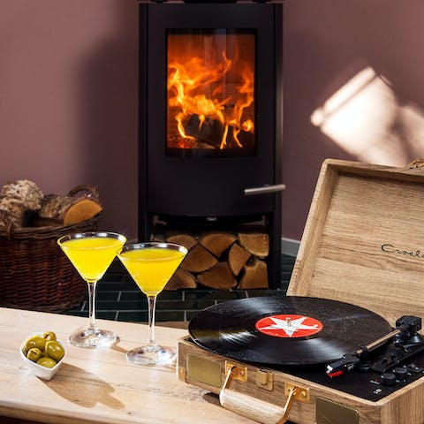 Toast your toes by the fire as you listen to classic LPs on the record player