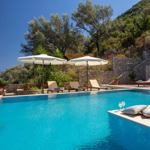 Spend lazy days lounging by the pool admiring the views