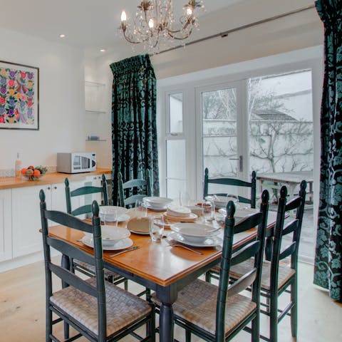 Tuck into plates of fish and chips on the wooden dining table