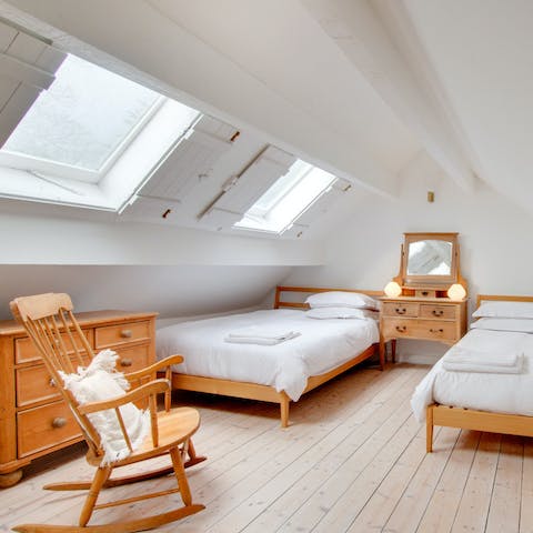 Get a restful night's sleep below the vintage-style skylight shutters