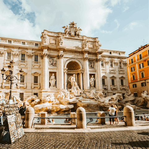 Head through the historic centre to the Trevi fountain 