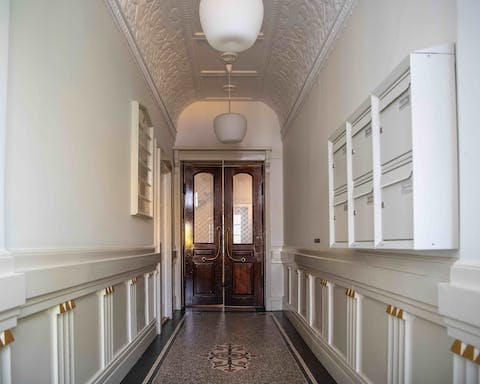 Stay in a beautiful building from 1791 with traditional old-school Copenhagen hallways