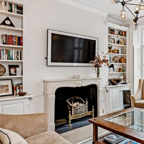 Get cosy around the fireplace, after a day of shopping in Knightsbridge